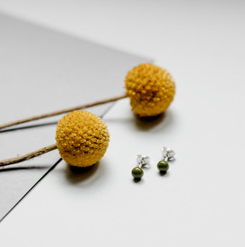 Pin earrings in olive